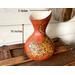 This image shows the cat vase is 10 by 6 inches. The shape of the gourd curves in at the center, and outward at the top rim. 